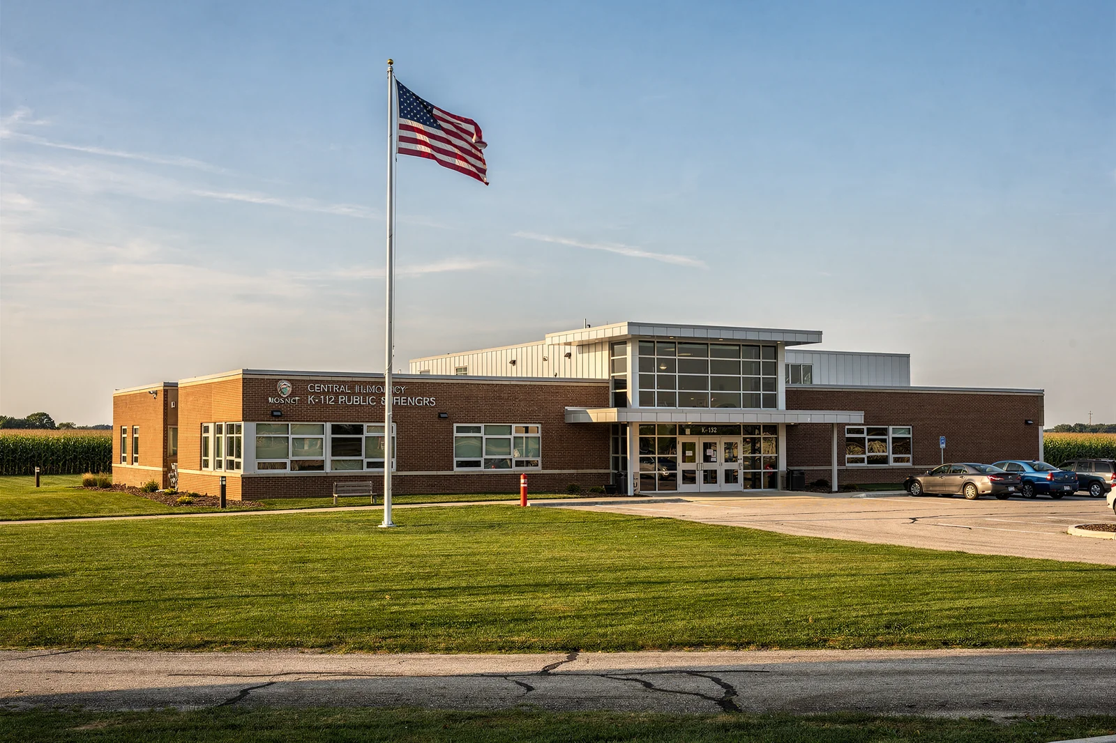 Central Illinois K-12 public school district campus with American flag